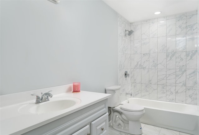 bathroom featuring toilet, marble finish floor, vanity, and shower / tub combination