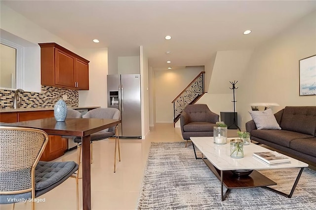 living area with stairway and recessed lighting