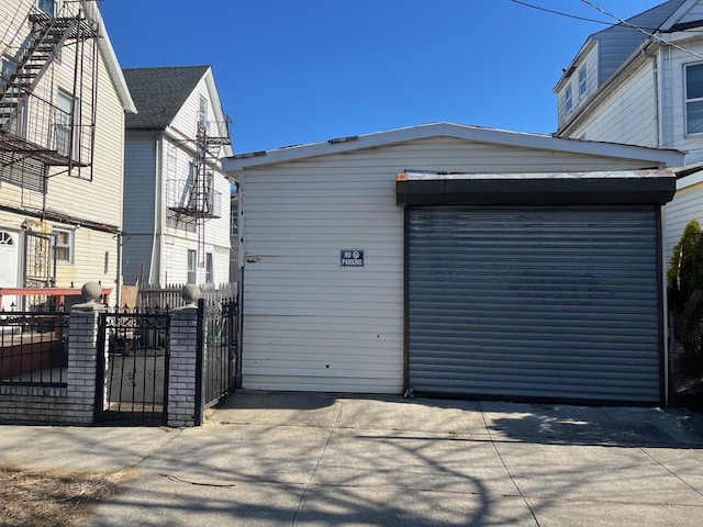 garage featuring fence