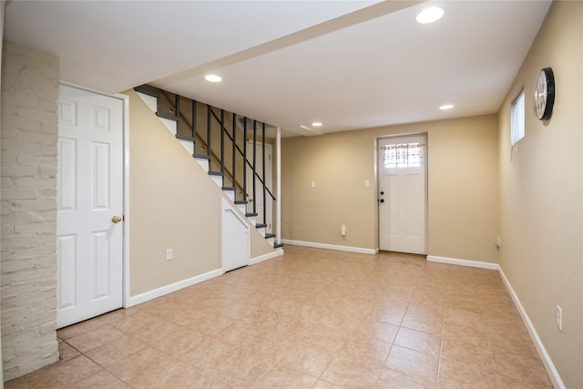 foyer featuring stairway, recessed lighting, and baseboards