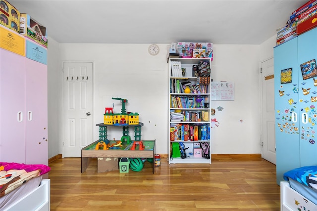 game room featuring wood finished floors