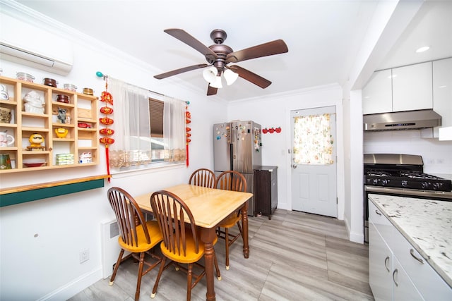 dining area featuring crown molding, an AC wall unit, a ceiling fan, and baseboards