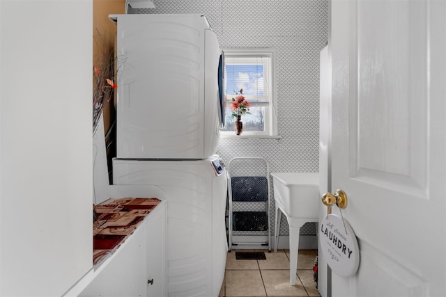 441 County Route 48, Thompson Ridge, NY 10985 - interior space with light tile patterned floors, a sink, laundry area, and stacked washer / dryer