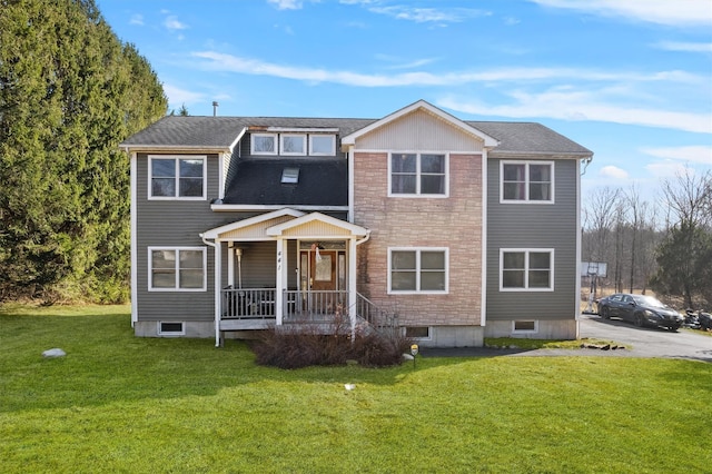 441 County Route 48, Thompson Ridge, NY 10985 - view of front of property with a front yard, covered porch, and a shingled roof