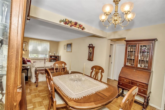 dining area with a notable chandelier