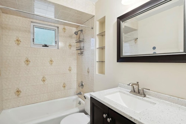 bathroom with vanity, toilet, and tub / shower combination