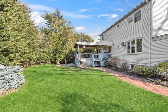 view of yard featuring a wall mounted AC