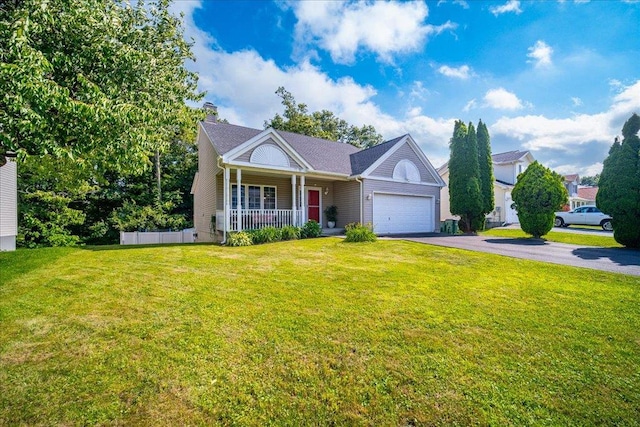10 Lyford Ln, Poughkeepsie, NY 12601 - view of front of home featuring covered porch, driveway, an attached garage, and a front lawn