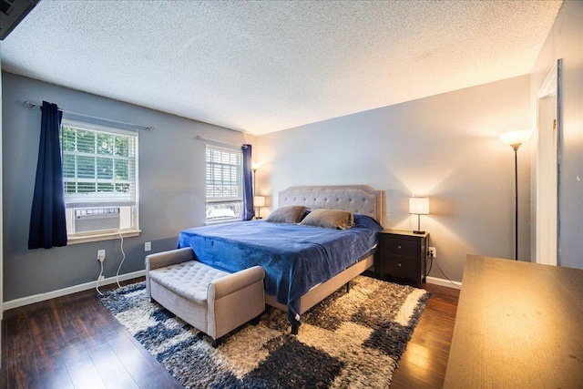 10 Lyford Ln, Poughkeepsie, NY 12601 - bedroom featuring a textured ceiling, hardwood / wood-style floors, and cooling unit