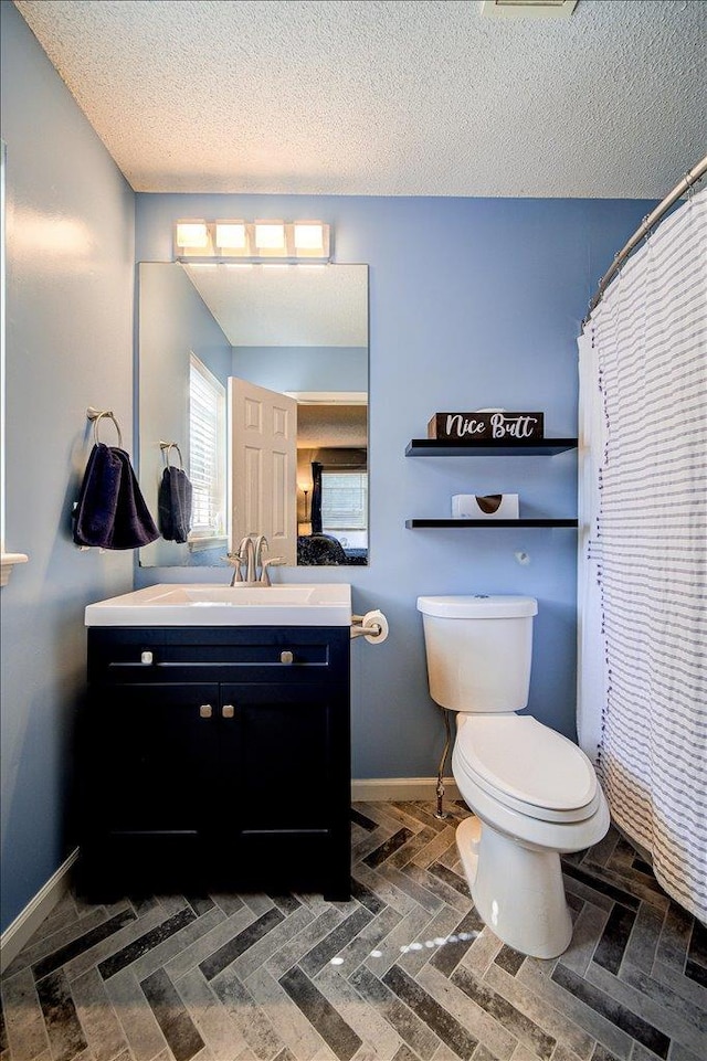 10 Lyford Ln, Poughkeepsie, NY 12601 - full bath with vanity, a textured ceiling, and a shower with shower curtain