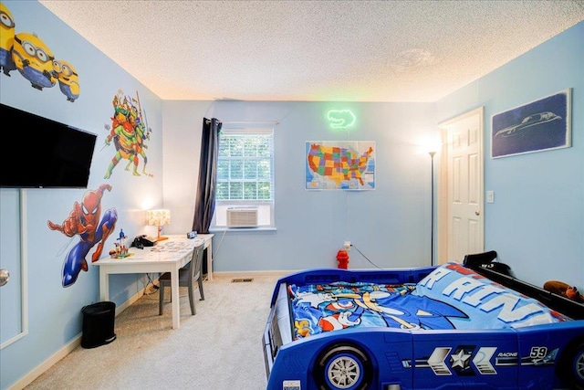 10 Lyford Ln, Poughkeepsie, NY 12601 - bedroom featuring carpet floors, a textured ceiling, and cooling unit