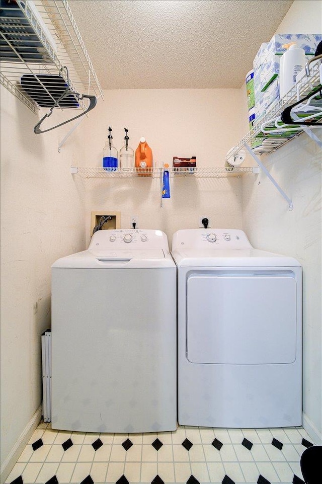 10 Lyford Ln, Poughkeepsie, NY 12601 - washroom featuring washer and dryer and a textured ceiling