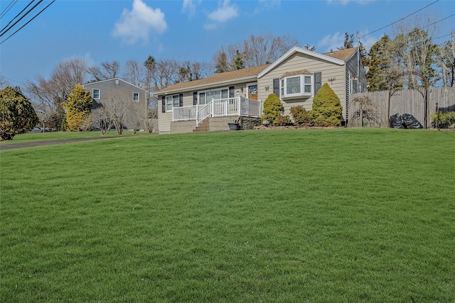 ranch-style house with a front lawn