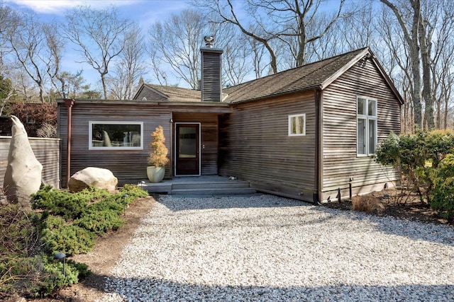 view of front of property featuring a chimney