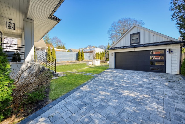 detached garage with fence