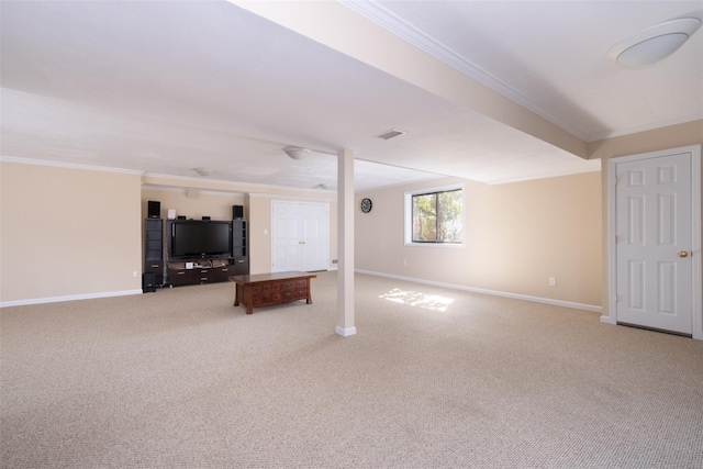 unfurnished living room with visible vents, baseboards, crown molding, and carpet