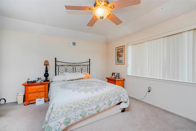 bedroom with carpet flooring, ceiling fan, and baseboards