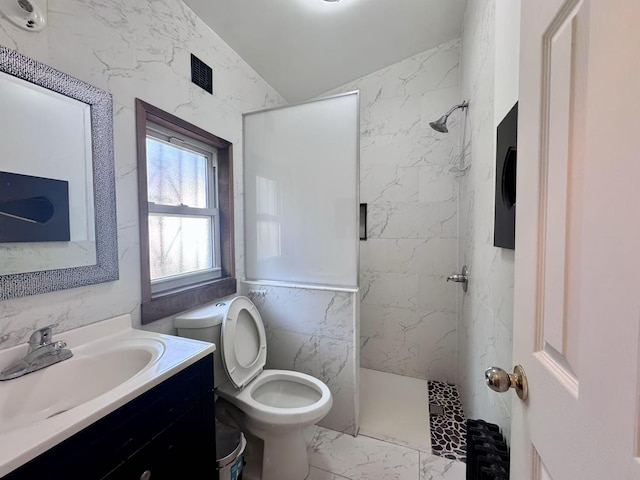 94-17 42nd Ave, Elmhurst, NY 11373 - full bath with walk in shower, vaulted ceiling, marble finish floor, toilet, and vanity
