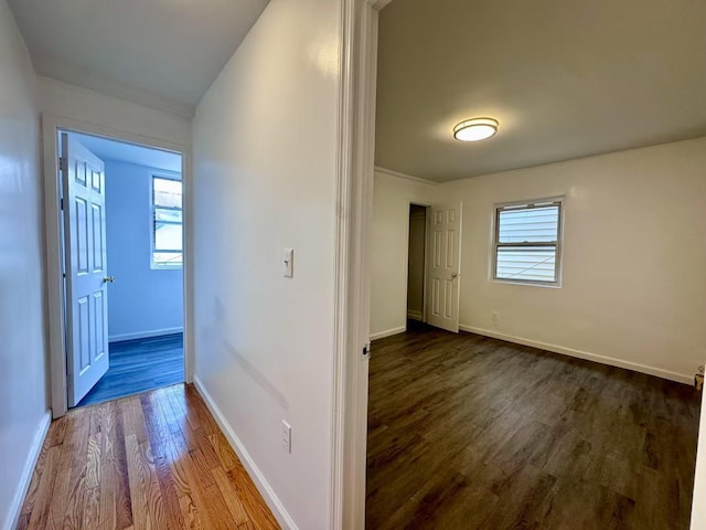 94-17 42nd Ave, Elmhurst, NY 11373 - hall featuring dark wood finished floors and baseboards
