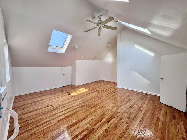 94-17 42nd Ave, Elmhurst, NY 11373 - bonus room with lofted ceiling with skylight, ceiling fan, baseboards, and light wood-type flooring