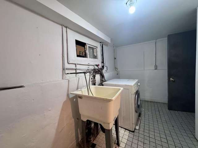 94-17 42nd Ave, Elmhurst, NY 11373 - laundry room with light tile patterned floors, washing machine and dryer, and laundry area