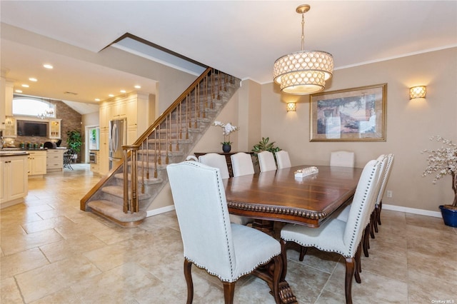 dining room featuring baseboards, stairway, vaulted ceiling, ornamental molding, and recessed lighting