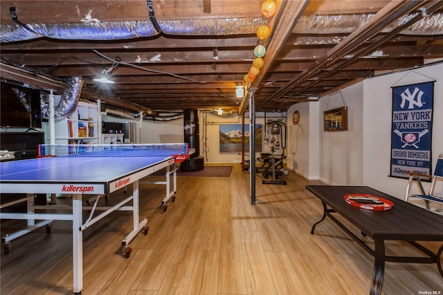 recreation room with wood finished floors