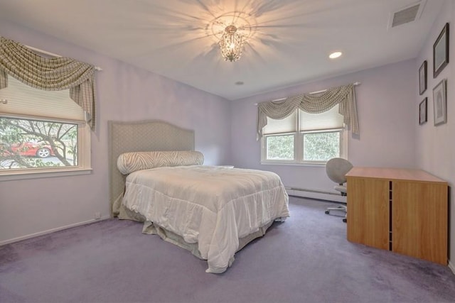 bedroom with carpet flooring, recessed lighting, a baseboard heating unit, and visible vents