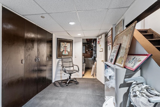 office featuring recessed lighting, baseboards, a paneled ceiling, and carpet