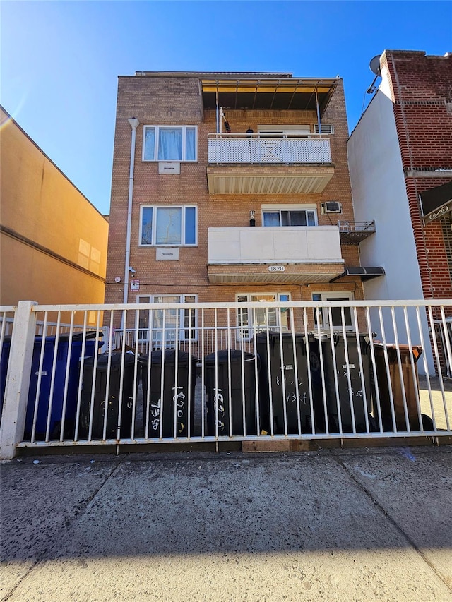 view of property with fence