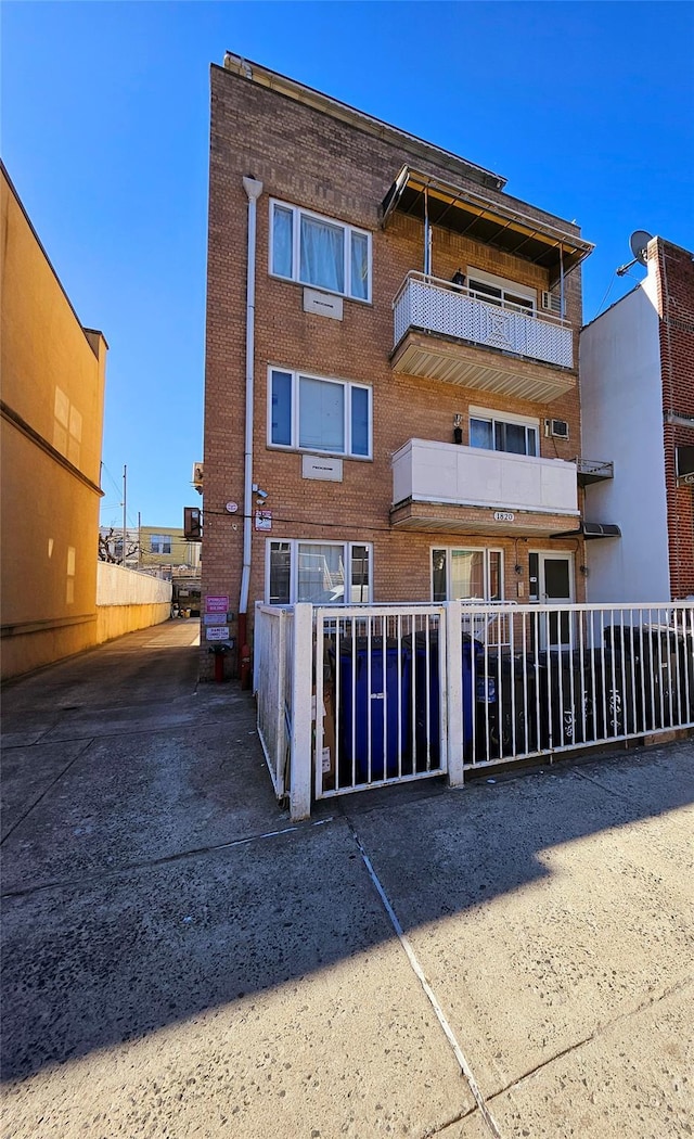 view of property featuring fence