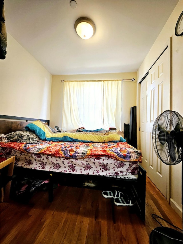 bedroom featuring wood finished floors