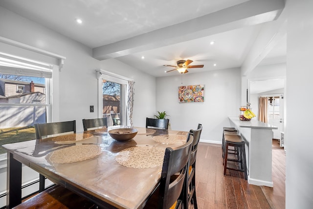 dining area with recessed lighting, baseboards, a healthy amount of sunlight, and dark wood-style flooring