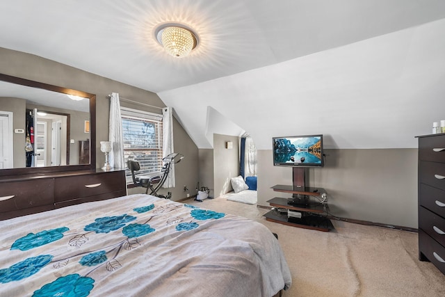 carpeted bedroom featuring lofted ceiling