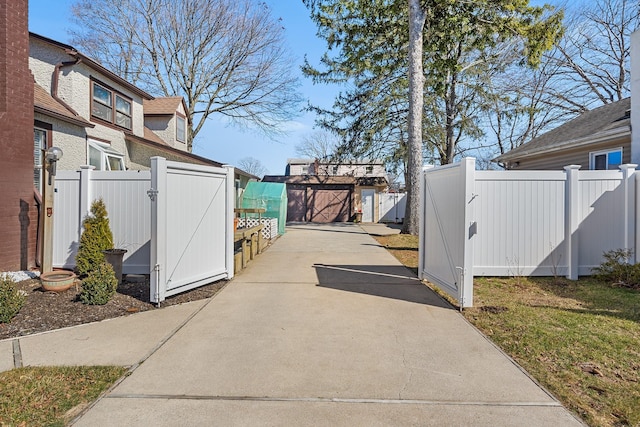 exterior space with an outbuilding and fence