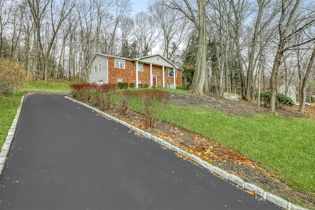 view of front facade featuring brick siding