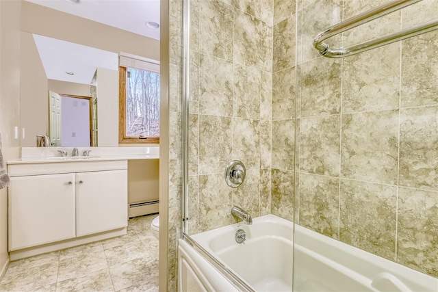 full bathroom featuring toilet, baseboard heating, tile patterned floors, combined bath / shower with glass door, and vanity