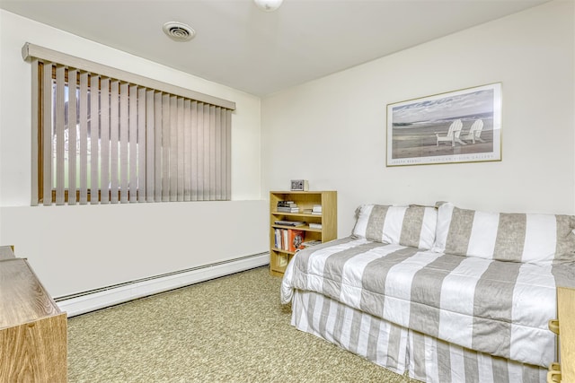 carpeted bedroom with visible vents and baseboard heating