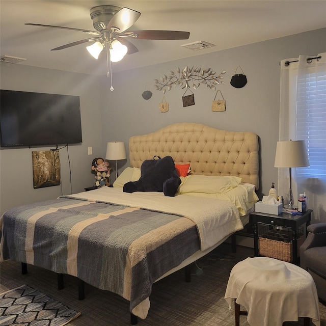 bedroom with a ceiling fan and visible vents