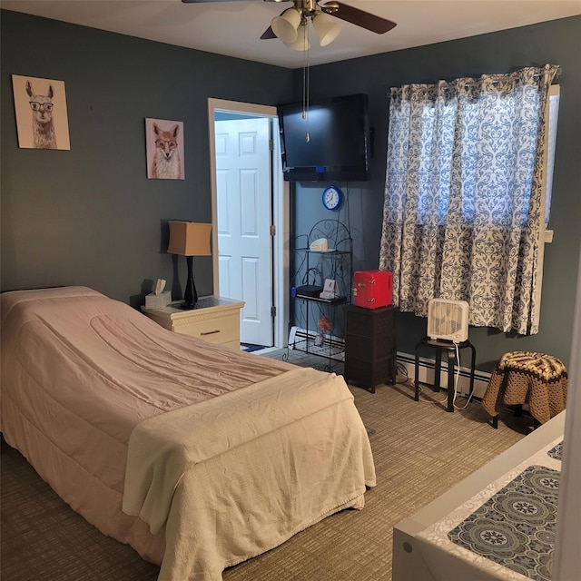 bedroom featuring a baseboard radiator, baseboard heating, and a ceiling fan