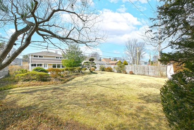 view of yard featuring fence