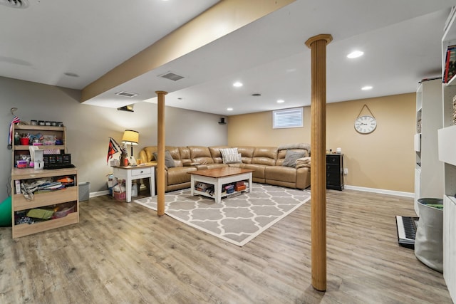 living area featuring visible vents, recessed lighting, and light wood-type flooring