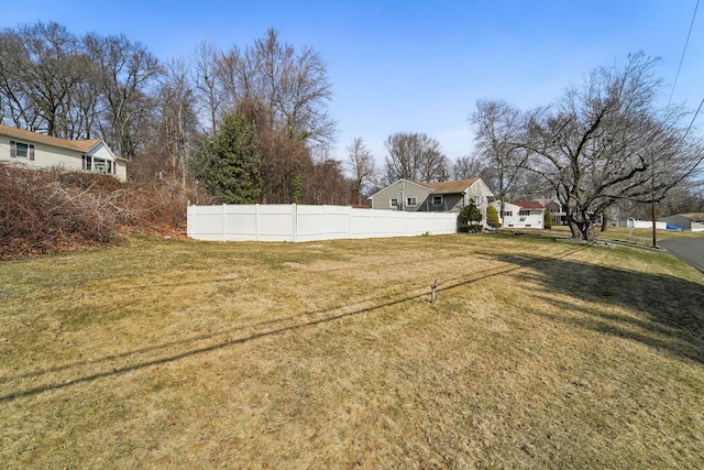 view of yard with fence