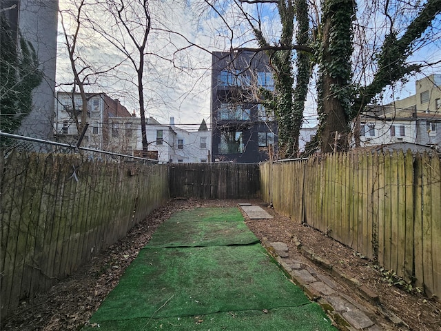 view of yard featuring a fenced backyard