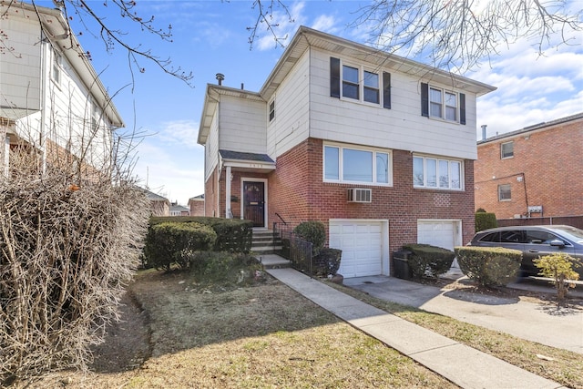 view of front of property with brick siding, an attached garage, and concrete driveway