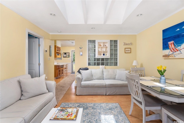 living area featuring recessed lighting and light wood-type flooring