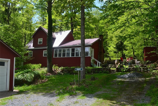 237 Trout Brook Rd, Roscoe, NY 12776 - view of side of property featuring a chimney and metal roof