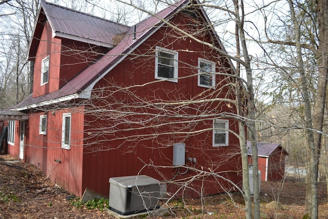 237 Trout Brook Rd, Roscoe, NY 12776 - view of side of home with metal roof, a barn, and an outdoor structure