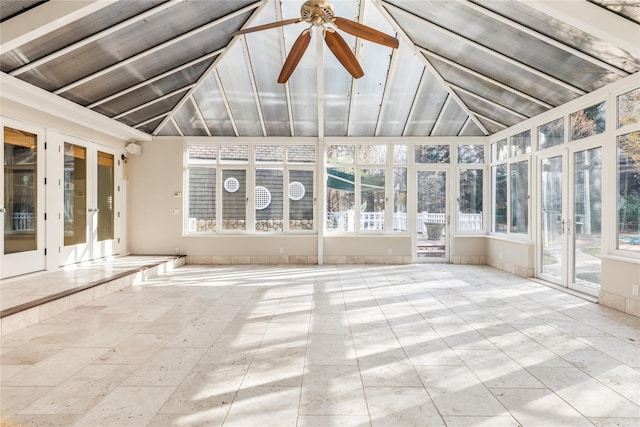 unfurnished sunroom with ceiling fan and vaulted ceiling