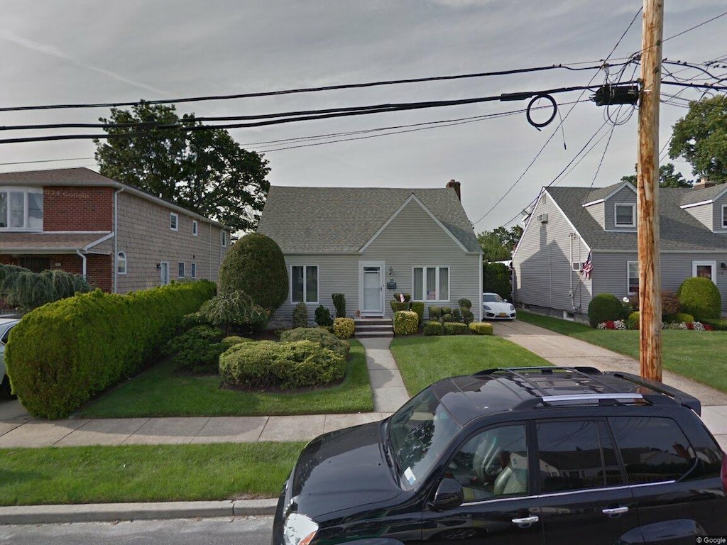 view of cape cod-style house